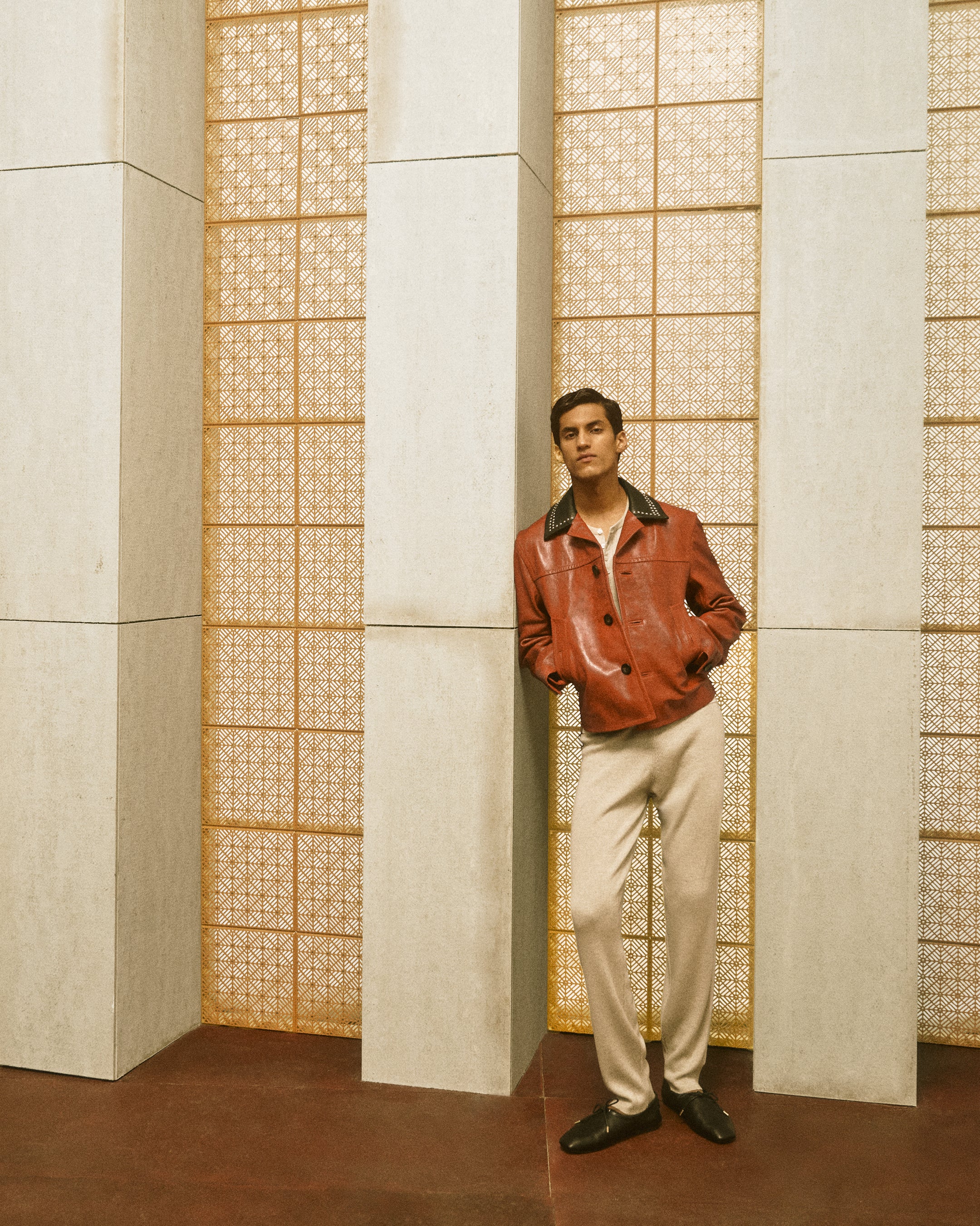 Wales Bonner Morning Raga AW26 look 16, rust-toned jacket and pale trousers